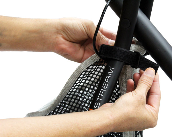 Loop velcro through plastic buckle.